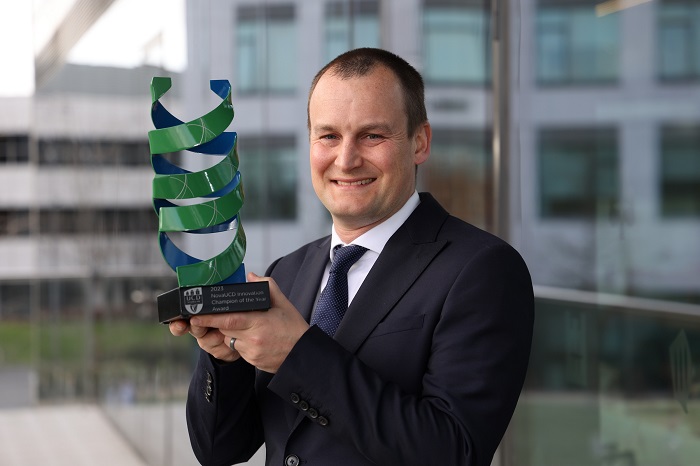 A photo of Dr Eoin O'Cearbhaill holding a trophey